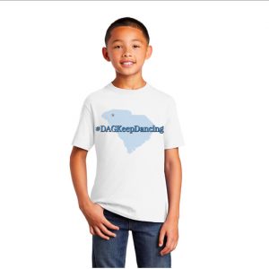 A young boy wearing a t - shirt with the state of south carolina on it.